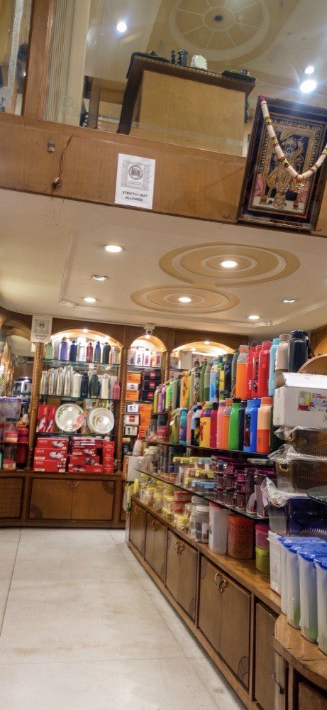 Interior of the Paradise Plastics retail showroom, shelves of houseware and kitchenware